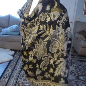 Decorative scarf In black and tan print with fringes